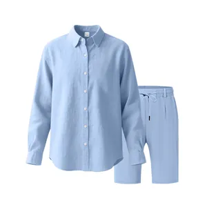 Detailed view of men's light blue linen set with long-sleeve shirt and matching shorts