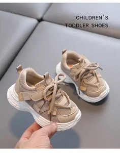 Detail of breathable mesh toddler sneakers in beige with anti-slip chunky soles