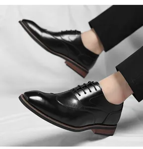 Close-up of black leather Oxford shoes for men, showcasing elegant business style.