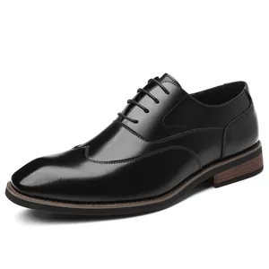 Classic black leather business Oxford shoes for men with a polished finish and laces