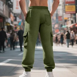 Rear view of men's olive green cargo jogger pants featuring thick waffle texture