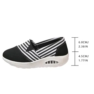Detail showing 6.0cm and 4.5cm height measurements on striped canvas rocking shoes