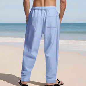 Comfortable light blue loose linen beach pants for men featuring elastic waist and back pocket
