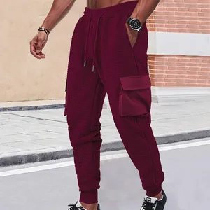 Men's heavy waffle knit cargo jogger pants in burgundy wine red with drawstring waist