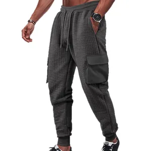 Men's heavyweight waffle texture cargo joggers featuring drawstring waist in dark grey