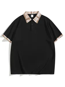 Stylish men's black polo shirt featuring a classic tan plaid collar and sleeve cuff detail