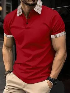 Detail of a red men's polo shirt featuring a stylish plaid collar and sleeve cuffs.