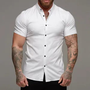 Close-up detail of a white muscle-fit short-sleeved shirt with black buttons and slim cut