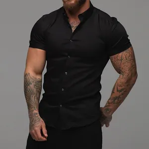 Detailed view of men's muscle fit black short sleeve shirt showing athletic silhouette