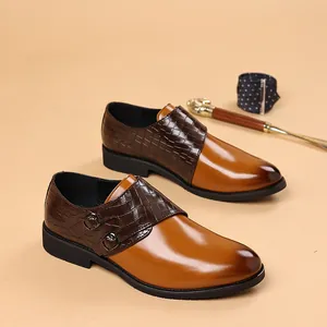 Close-up detail of premium men's leather dress shoes with crocodile texture and dual buckles