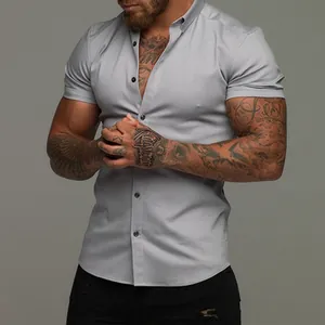 Men's slim fit muscle short sleeve shirt in light grey featuring a button-down collar design.