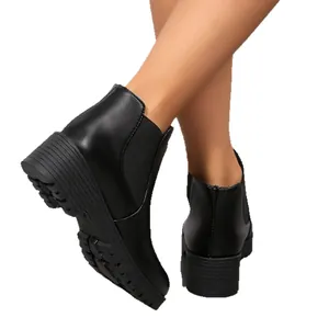 Botines Chelsea negros clásicos para mujer con punta redonda, tacón grueso y suela dentada