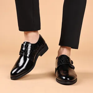 Men's black formal leather dress shoes with crocodile texture detail and polished finish