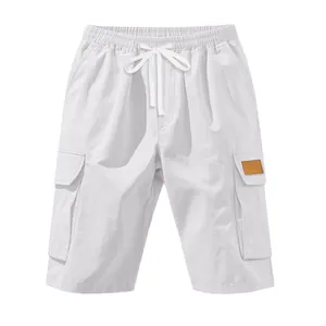 Front view of men's white cargo shorts featuring a multi-pocket tactical design.