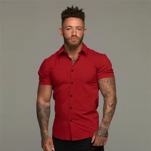 Muscle fit red short sleeve button-up shirt for men in solid minimalist style
