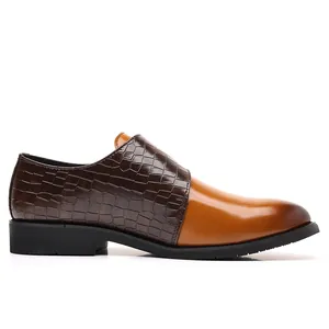 Professional men's brown crocodile embossed dress loafers with polished leather toe
