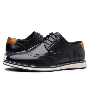 Classic black leather Brogue dress shoes for men with wingtip detailing and brown heel