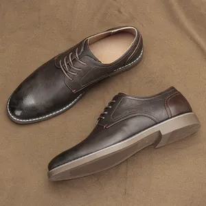 Detail view of vintage brown men's casual derby shoes with textured leather finish