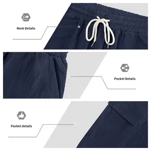 Detailansicht von Kordelzugbund und seitlichen Cargo-Taschen einer dunkelblauen Freizeithose