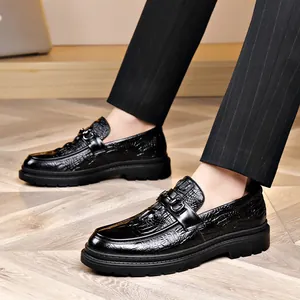 Premium black men's loafers featuring elegant crocodile skin texture and metal buckle