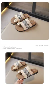 Sandalias de flecos trenzados estilo bohemio con flor de camelia y suela plana mujer.