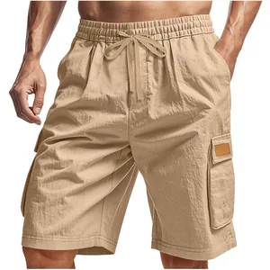Close-up view of khaki cargo shorts featuring an elastic drawstring waist and side pockets