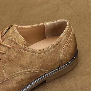 Close-up detail of retro brown leather shoe showing fine stitching and durable textured finish