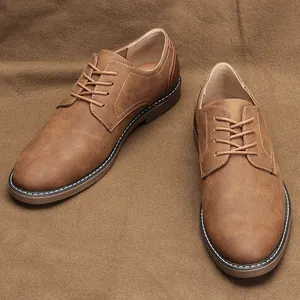 Close-up shot of classic brown retro men's casual leather shoes with elegant stitching