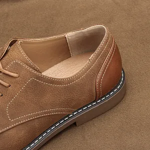 Detail view showing high-quality stitching on retro brown leather men's casual shoes