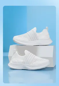 Professional close-up of white breathable mesh kids' slip-on sneakers for summer season