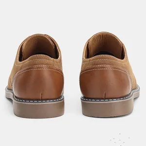 Rear view of men's vintage brown casual leather shoes with white contrast stitching