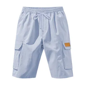 Front view of light blue men's relaxed fit cargo shorts with drawstring waist and pockets