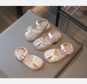 Summer girls' woven closed-toe sandals in silver and cream with cute bow details