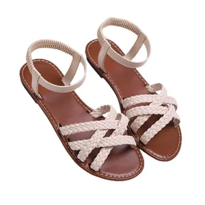 Elegante flache Damen-Sandalen mit geflochtenen Riemen und elastischem Riemen