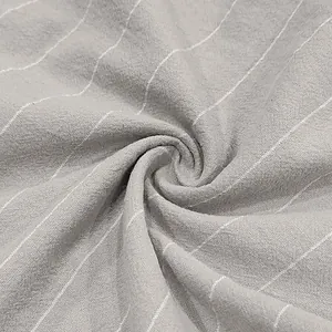 Detailed macro view of gray breathable linen fabric with white vertical stripes