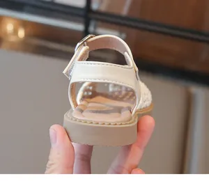 Close-up of the heel and soft sole of breathable woven closed-toe toddler sandals