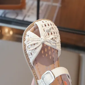Woven breathable closed-toe baby girl sandals with decorative bow and soft rubber sole