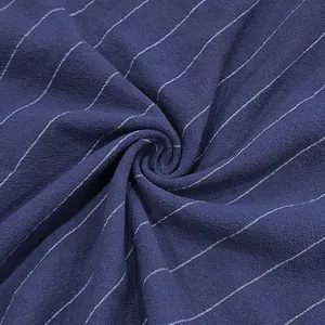 Close-up view of navy blue vertical pinstripe linen fabric texture for men's shorts