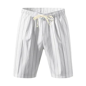 Detailed view of white vertical striped men's beach shorts with drawstring waist.