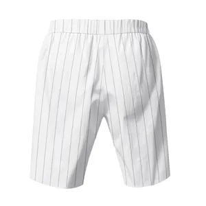 Detailed back view of men's loose breathable linen striped beach shorts in white color