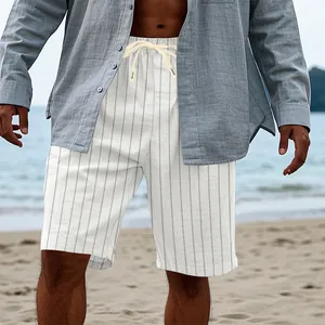 Detailed macro view of men's summer white vertical striped linen beach shorts with drawstring