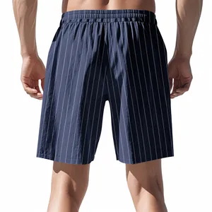 Rear view of men's navy blue pinstriped shorts with comfortable elastic waistband detail