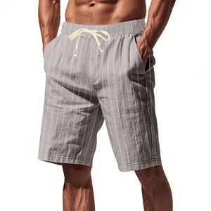 Close-up detail of men's striped linen shorts showing textured fabric and drawstring