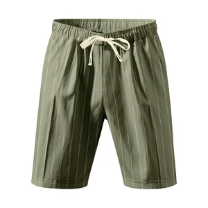 Detailed view of men's army green linen shorts with white vertical stripes and drawstring.
