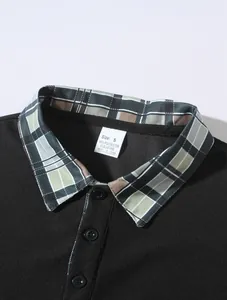 Detailaufnahme eines schwarzen Herren-Poloshirts mit einem modischen Karokragen