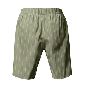Back view of men's army green vertical striped linen beach shorts with elastic waist