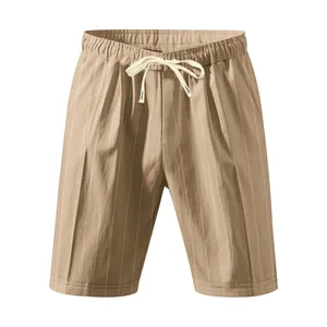 Close-up showing the vertical stripes and drawstring waist of khaki linen men's shorts