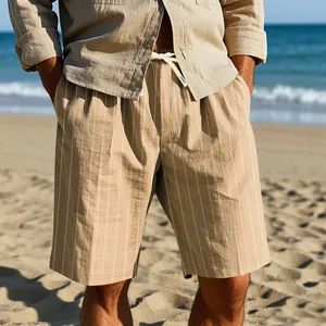 Macro detail of men's beige striped linen shorts with drawstring for beach vacation