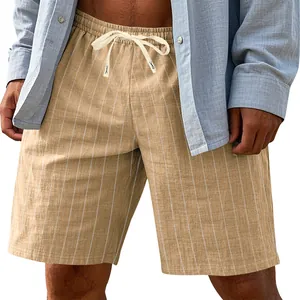 Detail view of men's linen beach shorts with vertical stripes and drawstring
