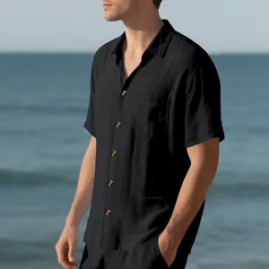 Side view of a men's black short-sleeved button-up shirt with a linen-like texture
